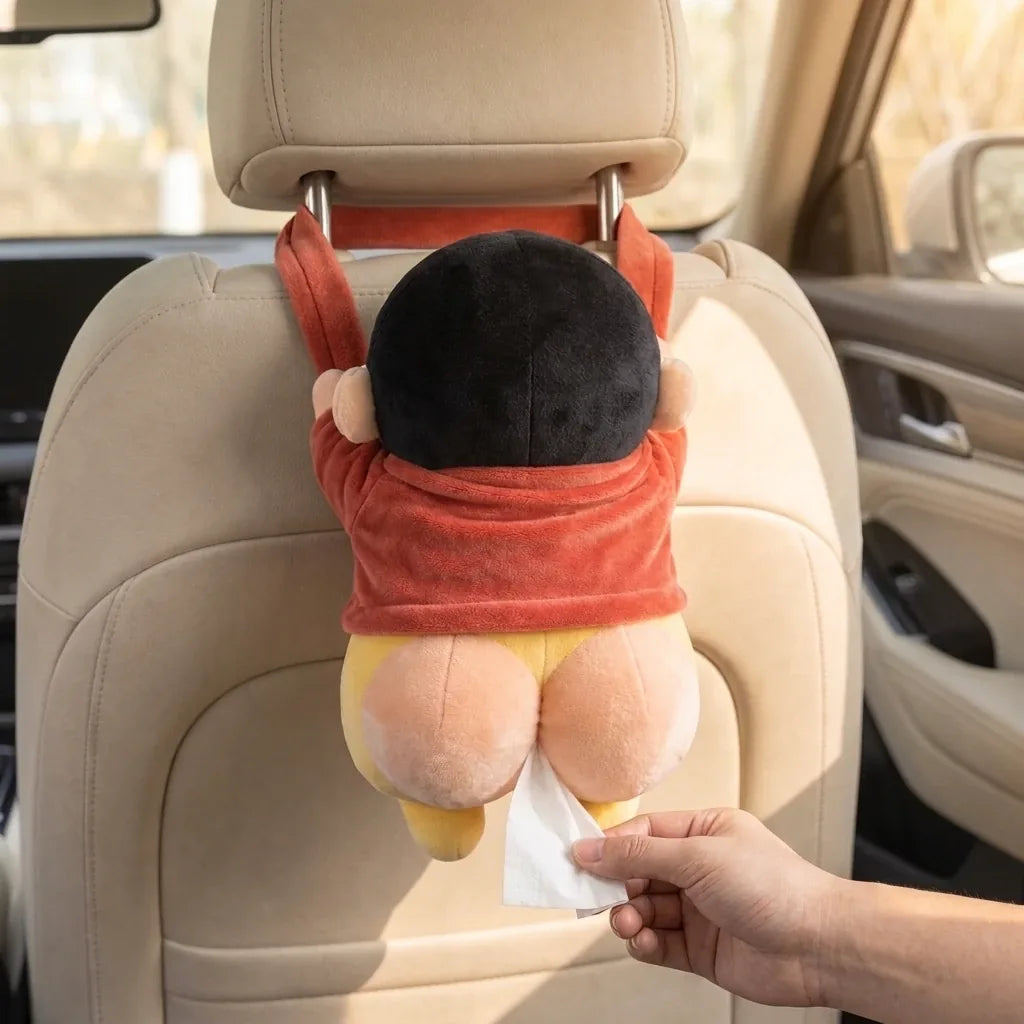 Plush tissue holder hanging from a car headrest