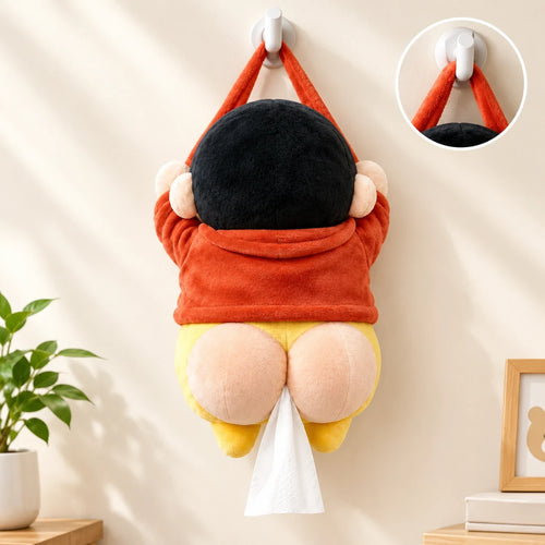 Plush tissue holder hanging on a wall hook